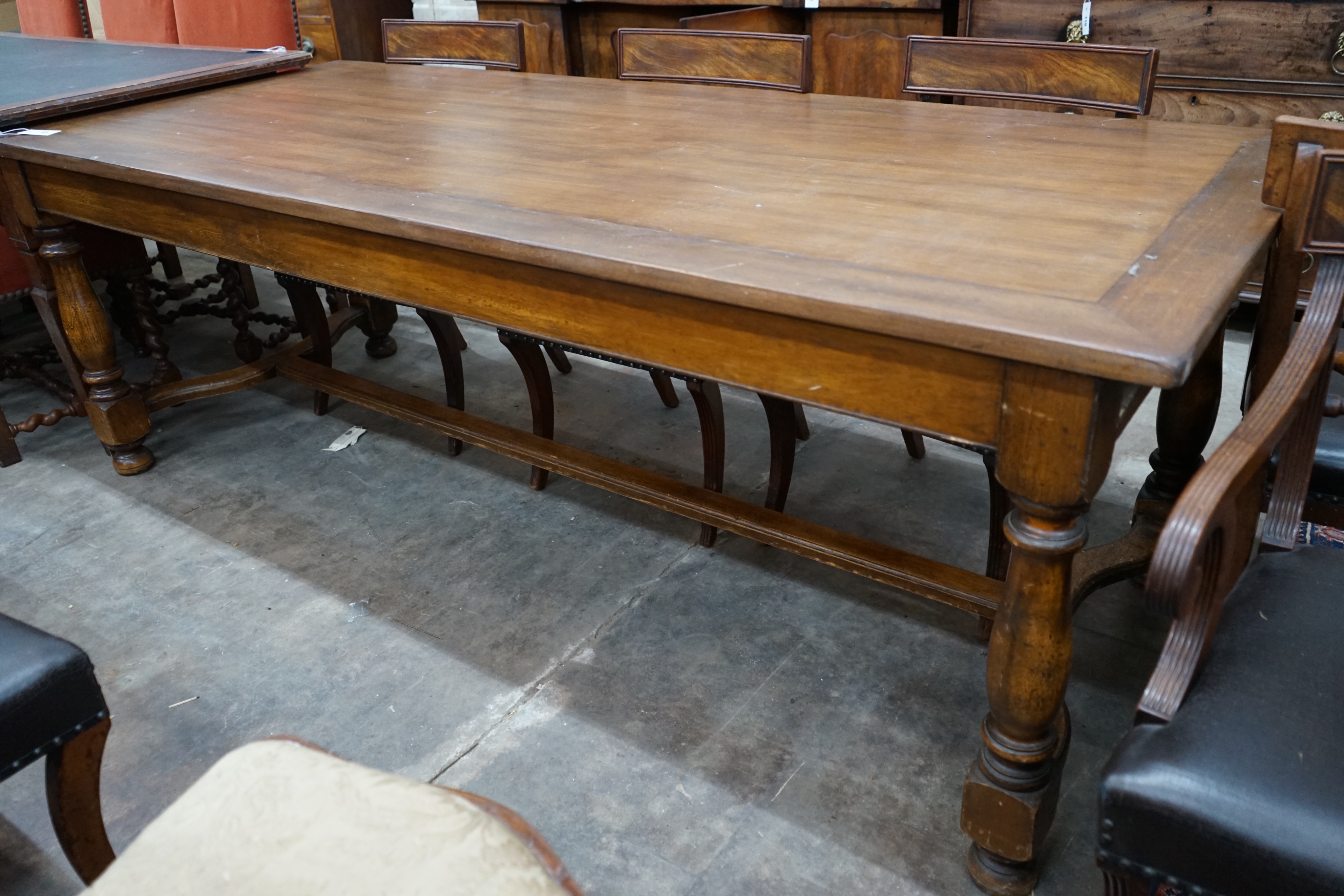 An 18th century style rectangular oak and walnut refectory dining table, 216cm width 89cm height 76cm